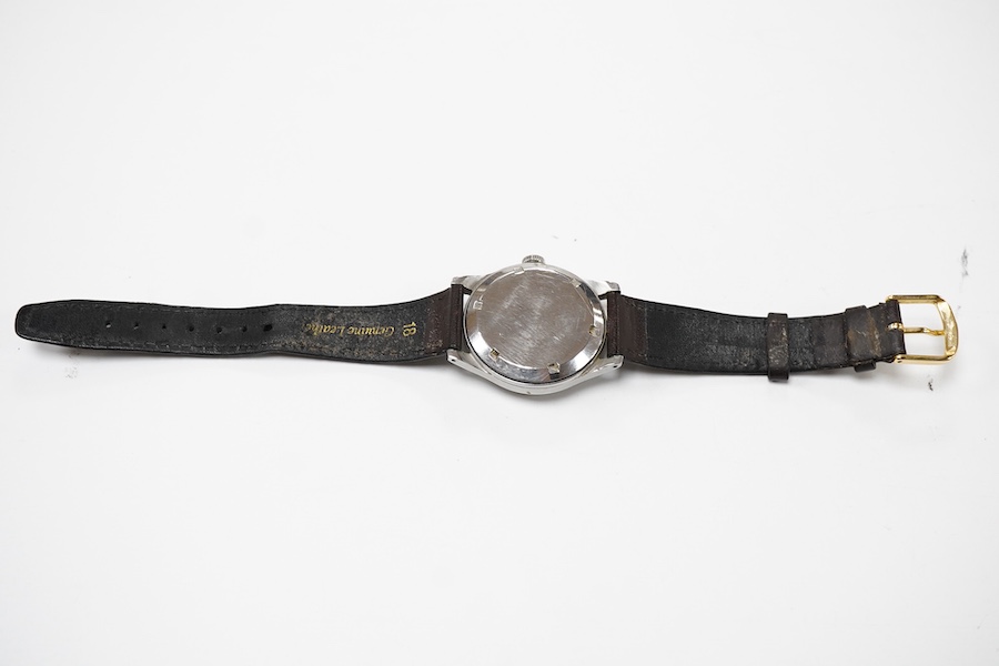 A gentleman's mid 1940's stainless steel Omega manual wind wrist watch, with Arabic dial, movement c.T2 SC PC, case diameter 35mm, on an associated leather strap, no box or papers.